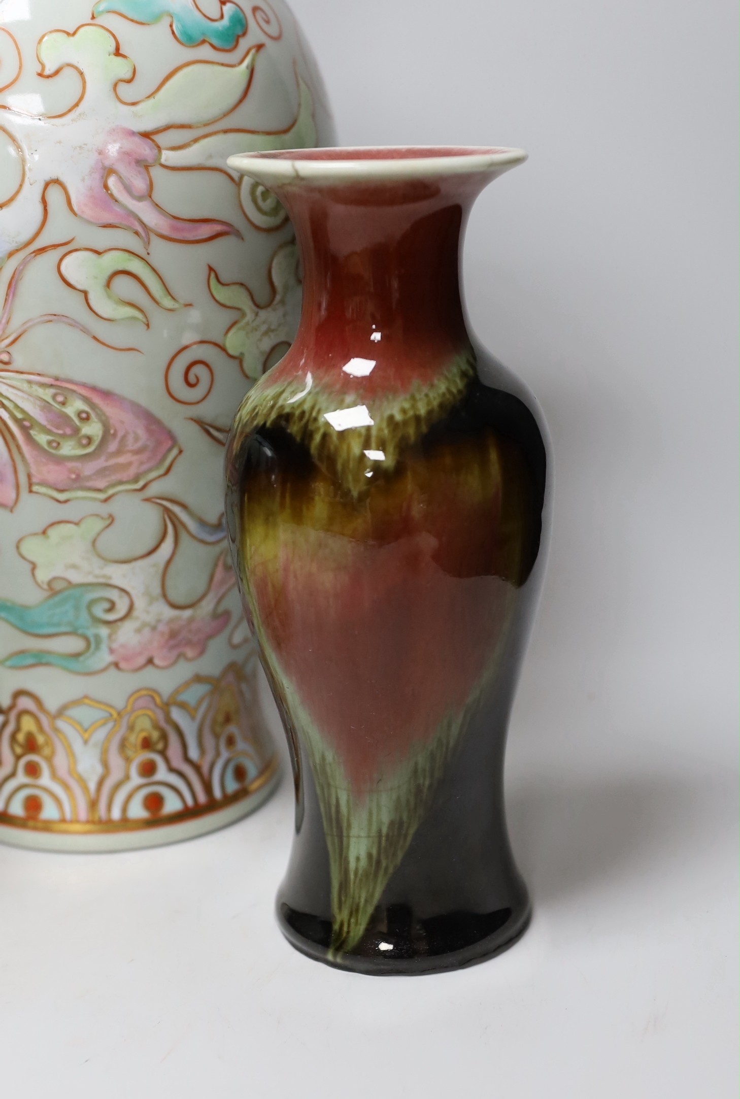 A Chinese blue and white celadon ground jar an enamelled porcelain vase and a flambe vase, tallest 42cms high (3)